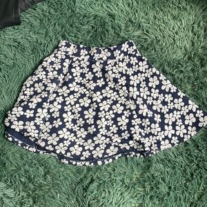 Nice, flows midi skirt that stops mid thigh, zipper, indigo and white flowers